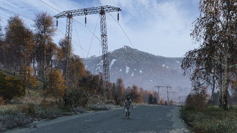 Power lines march across the Sakhal hills.